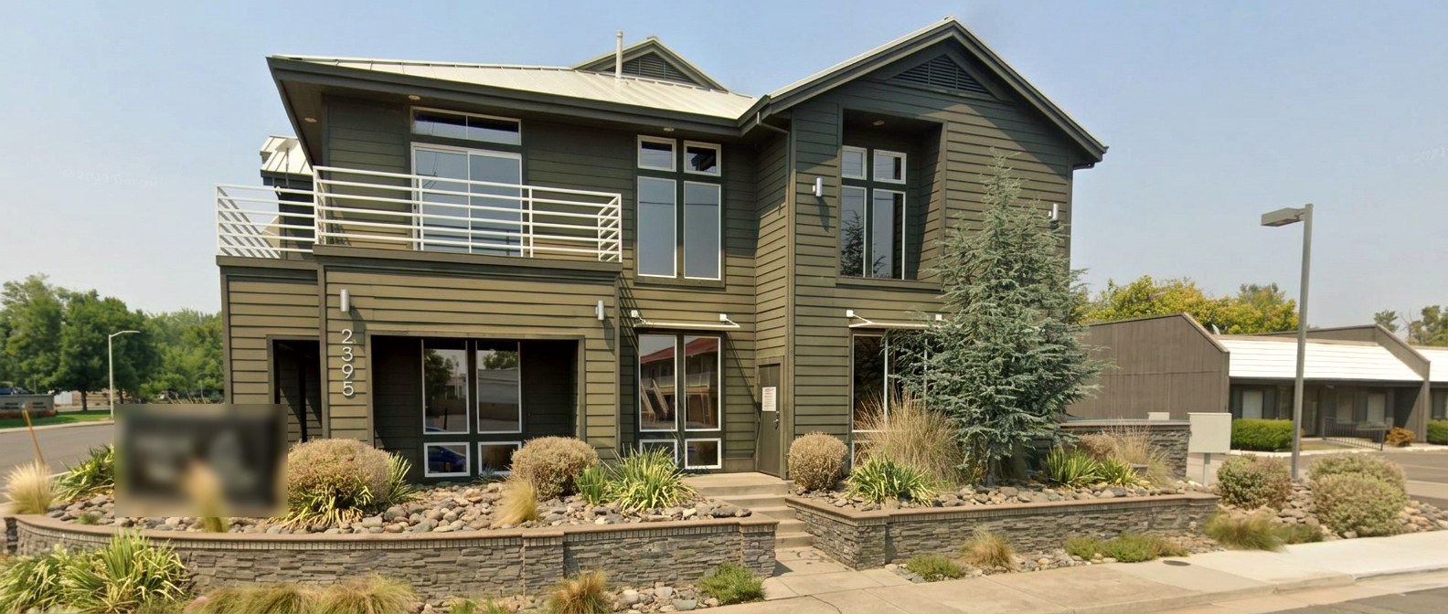 The sage-green office building on Bechelli Lane in Redding where Anne-Marie sees clients